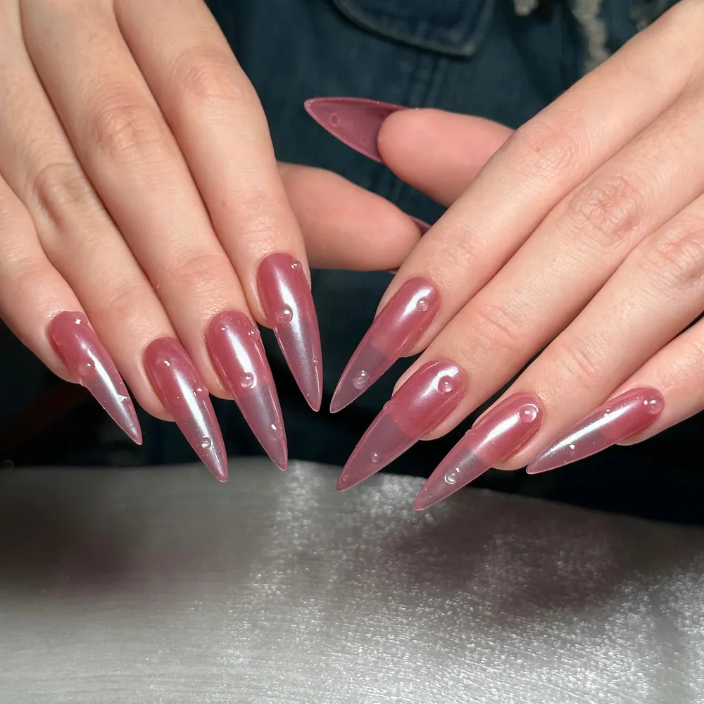 Nail mắt mèo tím hồng làm tại Huệ